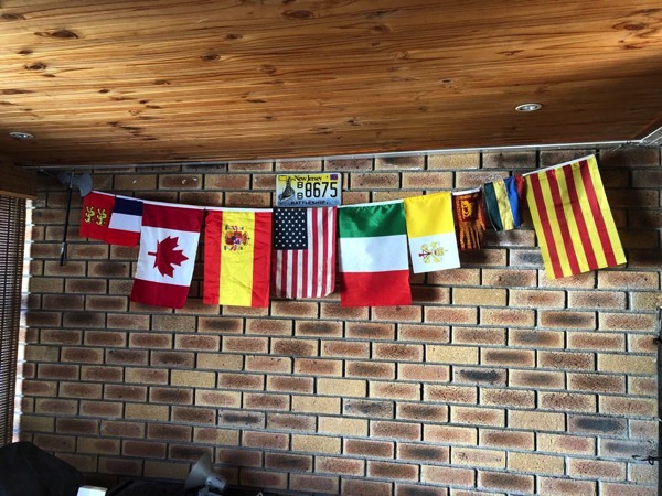 Selection of flags hanging on a wall